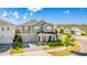 An aerial view shows this corner lot, two-story home, and attached two-car garage in a beautiful neighborhood at 11479 Satire St, Orlando, FL 32832