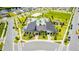 Aerial view of community amenities with pool, playground, and clubhouse providing resort-style living at 11479 Satire St, Orlando, FL 32832
