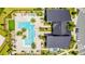 Aerial view of a community pool with ample lounging space near the community clubhouse at 11479 Satire St, Orlando, FL 32832