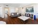 Cozy living room featuring hardwood floors, stylish decor, and a comfortable sofa at 11479 Satire St, Orlando, FL 32832