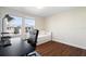 Home office showcasing a desk, chair, and daybed by the window, providing a comfortable and productive workspace at 11479 Satire St, Orlando, FL 32832