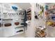 Organized pantry with adjustable shelving, spice racks, and ample storage for kitchen essentials and culinary supplies at 11479 Satire St, Orlando, FL 32832
