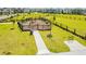 View of a community playground with safety mulch and equipment at 11479 Satire St, Orlando, FL 32832