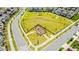 Aerial view of a community playground with walking paths at 11479 Satire St, Orlando, FL 32832
