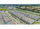 Aerial view of the townhomes and community showcasing its proximity to the highway at 14335 Sapelo Beach Dr, Orlando, FL 32827