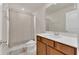 Bathroom featuring a vanity with countertop, toilet, and shower with curtain at 14335 Sapelo Beach Dr, Orlando, FL 32827