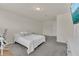 Comfortable bedroom featuring neutral decor and soft carpeting at 14335 Sapelo Beach Dr, Orlando, FL 32827