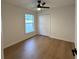 Comfortable bedroom with a ceiling fan, closet, and natural light at 1639 Corner Meadow Cir, Orlando, FL 32820
