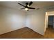 Cozy bedroom with a ceiling fan and a closet for ample storage at 1639 Corner Meadow Cir, Orlando, FL 32820