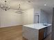 Open kitchen featuring a quartz countertop island and stainless steel appliances at 1639 Corner Meadow Cir, Orlando, FL 32820