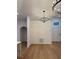 Spacious living area with modern lighting fixtures and neutral wall colors at 1639 Corner Meadow Cir, Orlando, FL 32820