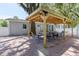 Pergola with brick patio, outdoor dining furniture at 2072 Grandview S Ave, Sanford, FL 32771
