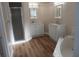 This bathroom is complete with dual sinks, a shower, and a tub at 2181 Wekiwa Oaks Dr, Apopka, FL 32703