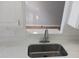 Kitchen featuring a new stainless sink and a granite countertop at 2181 Wekiwa Oaks Dr, Apopka, FL 32703