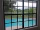 A wonderful backyard pool and fence is visible from this home at 2181 Wekiwa Oaks Dr, Apopka, FL 32703