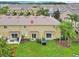 Overhead view of the home shows the spacious yard and surrounding landscaping of the community at 2311 Chatham Place Dr, Orlando, FL 32824