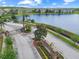 A beautiful lake front community entrance enhances the appeal of this luxurious neighborhood at 2311 Chatham Place Dr, Orlando, FL 32824