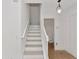 Entryway with a staircase leading to the second floor and a door at 2311 Chatham Place Dr, Orlando, FL 32824