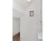 Hallway features a laundry area, tile floor and a framed 'laundry' sign on the wall at 2311 Chatham Place Dr, Orlando, FL 32824