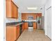 Well-lit kitchen with modern appliances and ample counter space at 2311 Chatham Place Dr, Orlando, FL 32824