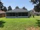 The home features a screen lanai and spacious backyard perfect for outdoor activities at 2555 Palmetto Ridge Cir, Apopka, FL 32712