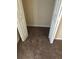 Ample closet with carpeting for storage in a neutral colored room at 2555 Palmetto Ridge Cir, Apopka, FL 32712