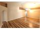 Bright living room featuring vaulted ceilings and beautiful wood laminate flooring at 2555 Palmetto Ridge Cir, Apopka, FL 32712