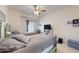 Charming bedroom featuring two twin beds, a ceiling fan, and lots of natural light at 2598 Robert Trent Jones Dr # 1030, Orlando, FL 32835