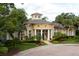 Stunning exterior view of a two-story home surrounded by lush landscaping at 2598 Robert Trent Jones Dr # 1030, Orlando, FL 32835