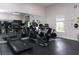 Gym featuring treadmills, ellipticals, and stationary bikes with large mirrors at 2598 Robert Trent Jones Dr # 1030, Orlando, FL 32835