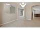 Inviting dining room with an open floor plan, neutral tones, and elegant chandelier lighting at 2674 Spicebush Loop, Apopka, FL 32712