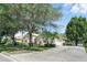 Lovely home with a long driveway, mature landscaping and side-entry garage at 2674 Spicebush Loop, Apopka, FL 32712