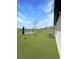 Backyard featuring a pond view at 2707 Virginia Pine Nw Dr, Bartow, FL 33830