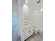 Bathroom featuring a circular mirror, white vanity with granite countertop, and a shower with a curtain at 2707 Virginia Pine Nw Dr, Bartow, FL 33830