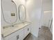 Double sink bathroom with granite countertops, modern fixtures, and tiled floors at 2707 Virginia Pine Nw Dr, Bartow, FL 33830