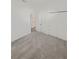 Bedroom with carpeting, and a double-door closet at 2707 Virginia Pine Nw Dr, Bartow, FL 33830
