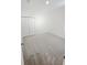 Carpeted bedroom with double closets and neutral colors at 2707 Virginia Pine Nw Dr, Bartow, FL 33830