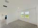 Cozy bedroom with lots of natural light shining in from the windows at 2707 Virginia Pine Nw Dr, Bartow, FL 33830