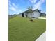 Single-story home featuring a well-maintained lawn and a two-car garage at 2707 Virginia Pine Nw Dr, Bartow, FL 33830