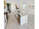 Modern kitchen featuring a large island with granite countertops and stainless steel appliances at 2707 Virginia Pine Nw Dr, Bartow, FL 33830
