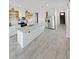 Open kitchen with granite countertops, stainless steel appliances, and ample cabinet space at 2707 Virginia Pine Nw Dr, Bartow, FL 33830
