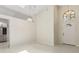Bright foyer featuring tile floors, a transom window, and high ceilings at 2933 Birmingham Blvd, Orlando, FL 32829