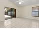 Bright living room with sliding glass doors leading to the patio at 2933 Birmingham Blvd, Orlando, FL 32829