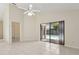 Spacious living room with ceiling fan and a view of the pool at 2933 Birmingham Blvd, Orlando, FL 32829