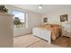Bedroom featuring a large window for natural light and neutral decor at 3018 Bransbury Ct, Kissimmee, FL 34747