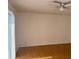 Bright living room featuring wood floors, white walls and natural light streaming through the window at 3057 Aaron Burr Ave # 2, Winter Park, FL 32792