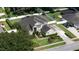 Overhead shot of a residence with well-maintained landscaping, a large yard, and a private driveway at 325 Green Ash Ln, Sanford, FL 32771