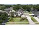 Beautifully landscaped home with manicured lawns, fountain, and mature trees in a lovely neighborhood at 325 Green Ash Ln, Sanford, FL 32771