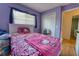 Bright bedroom with closet, large window, and cute decor, creating a cozy and cheerful space at 3822 Janie Ct, Orlando, FL 32822