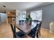 Open concept dining area with modern decor and wood floors at 3822 Janie Ct, Orlando, FL 32822
